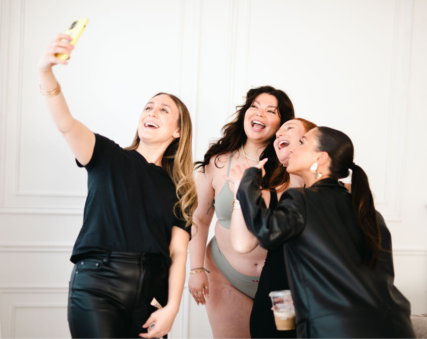 cheeky cherry co-founders taking a selfie photo with our team of boss babes